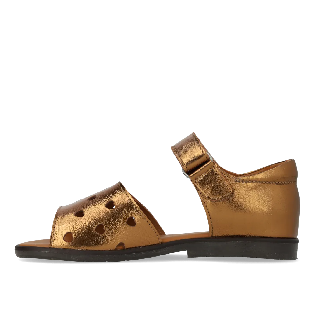Leather sandal with die-cut heart pattern