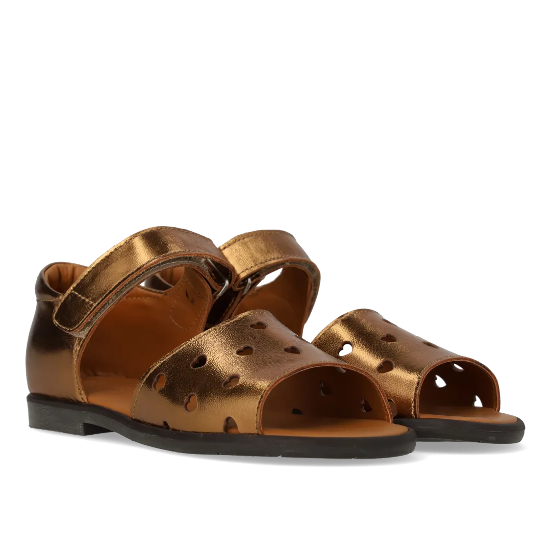 Leather sandal with die-cut heart pattern